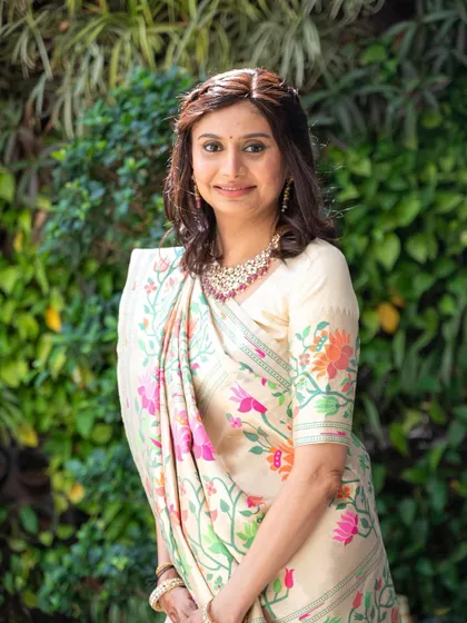 A portrait of the mother of the bride. I gave her a soft, elegant makeup look that complemented her beautiful floral saree.