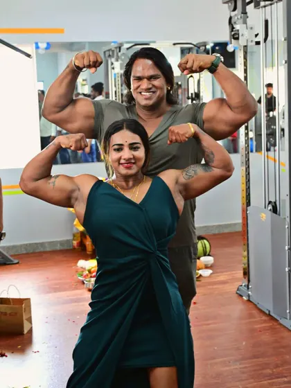 A powerful duo pose with a fellow bodybuilder. This shows the mutual respect and camaraderie in our sport.