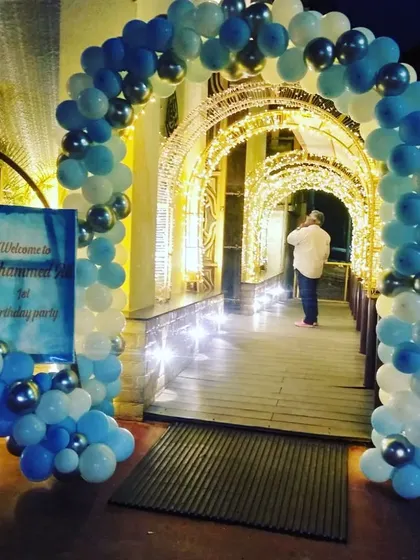 A welcoming balloon arch for a first birthday party. This simple yet festive entrance sets the tone for the celebration as soon as guests arrive.