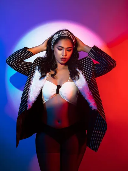A creative shot from the Hollywood editorial, using colored lighting.