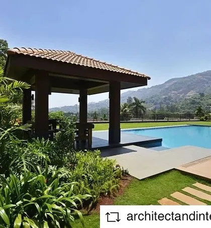 The pool and gazebo area of our Khandala valley project. Surrounded by lush greenery and mountain views, this space was designed to be the ultimate spot for relaxation and enjoying the natural beauty of the location.