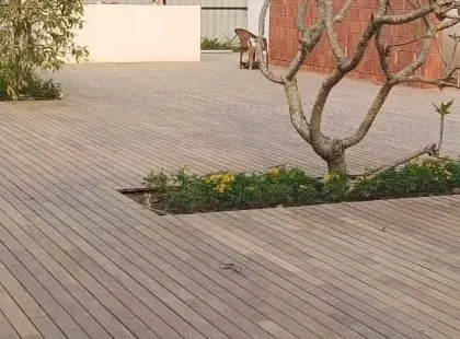 The finished deck provides a vast, beautiful, and durable surface for any outdoor activity, from events to simple relaxation.