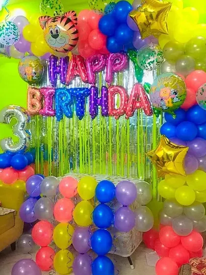A closer look at the vibrant 3rd birthday decoration.