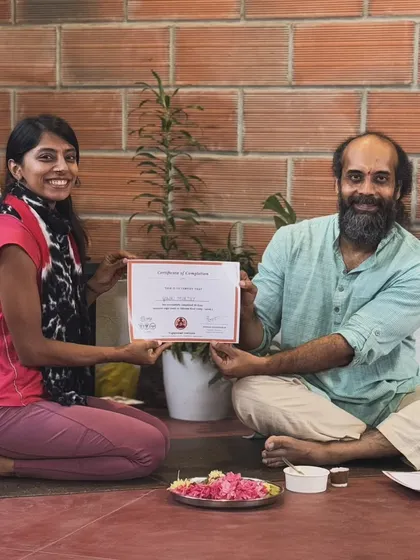 Receiving my certificate of completion. I am always a student first, and I'm so grateful for my teachers who guide me on this path of learning and growing.