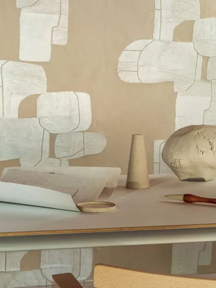 The 'Voyage Initiatique' design from Élitis, showcasing how paper can be elevated to an art form. The abstract, layered shapes create a sophisticated and modern composition, perfect for an artistic interior.