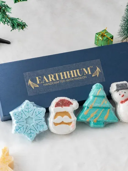 Make bath time merry with my Christmas-themed bath bomb gift set. This box includes four festive shapes: a snowflake, Santa, a Christmas tree, and a snowman, making it a perfect stocking stuffer.