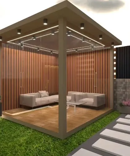 A 3D render of a cozy, enclosed pergola. The slatted wood walls provide privacy, while the open front connects the space to the surrounding lawn.