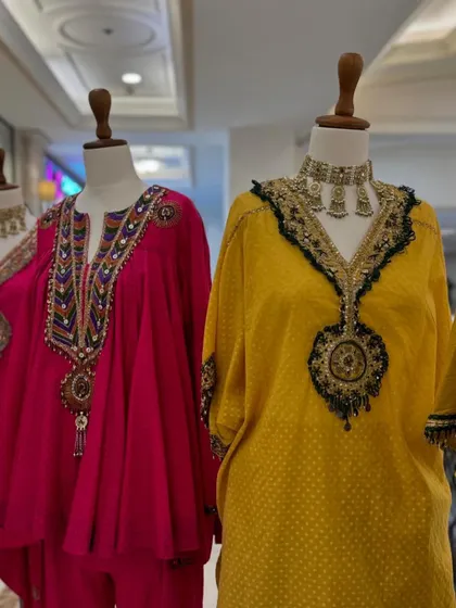 A collection of festive kurtas with heavily embellished necklines. These pieces are perfect for when you want to make a statement with your jewelry and outfit.