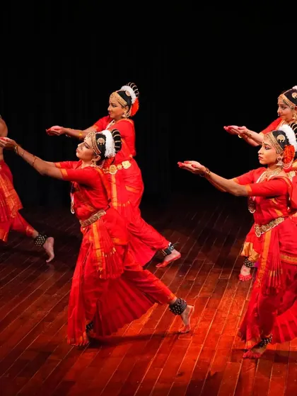 My students and I in a synchronized movement during a stage performance. Group choreography requires immense practice and a deep understanding of rhythm and space.