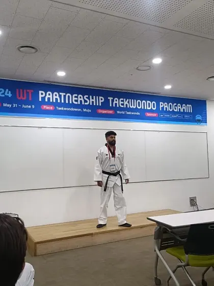 On stage during the 2024 WT Partnership Taekwondo Program in Muju, South Korea.