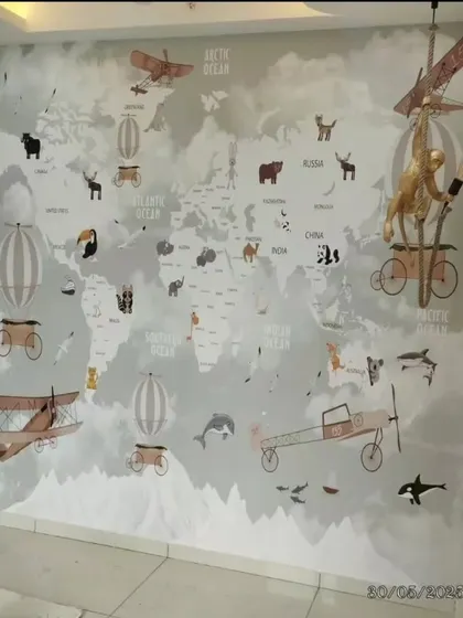 This world map mural is a fantastic way to learn and dream. It features vintage-style planes and hot air balloons, along with animals from around the globe.