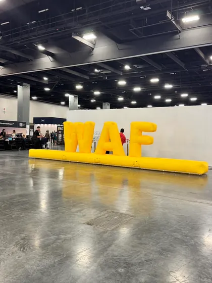 The iconic WAF installation at the convention center in Miami. This image captures the scale and excitement of the festival, which I bring to my audience through real-time updates and coverage.