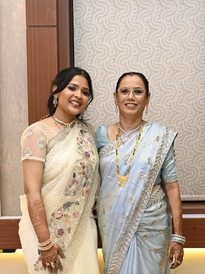 A perfect mother-in-law and daughter-in-law duo. I provided coordinated makeup for both, ensuring their looks were age-appropriate, elegant, and complemented their pastel sarees.