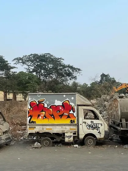 The finished mango-themed throw-up on an abandoned truck. Just adding some color to the urban landscape.