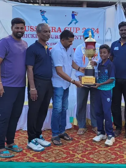 Ehan Shaik receiving the Best All-Rounder award at the Dasara Cup Hubli.