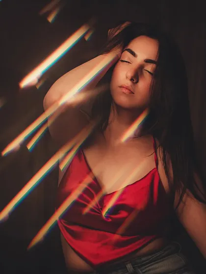 Playing with a prism to create beautiful rainbow light flares. This photo is artistic, creative, and visually stunning.