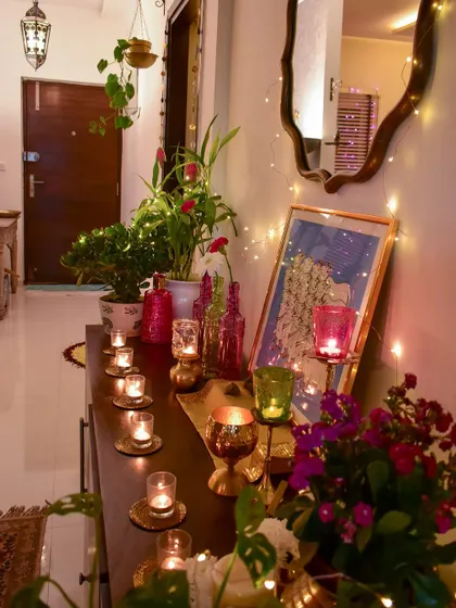 These are my all-time favorite festive moments. This shot of my console table, lit with diyas and fairy lights, is pure magic.