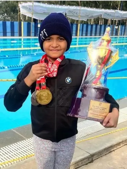 Samriddhi S Harisha with her trophy after winning her third individual championship in the Group V category at the ZSA Grand Prix '22.