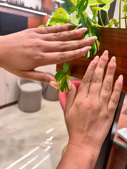 Another angle of the pink and shimmer nails, showing how they look from the side. The almond shape is so elegant.