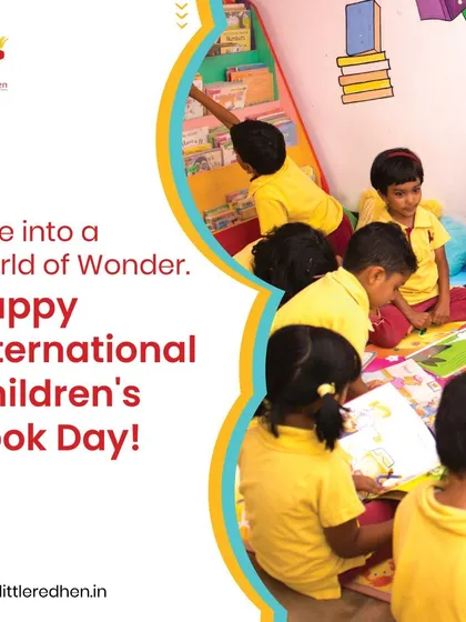 Children are gathered on the floor, happily exploring books in the library. This image celebrates International Children's Book Day and our belief in the magic of stories.