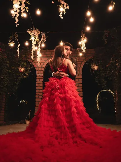 A duplicate of 74, a romantic night-time pre-wedding shoot with the stunning red ruffle gown.