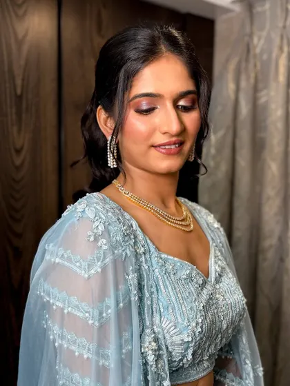 A close-up of the eye makeup, showing the beautiful blend of colors and shimmer.