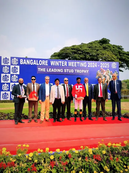 The winning team of N R I Ace celebrates their victory in The Leading Stud Trophy.