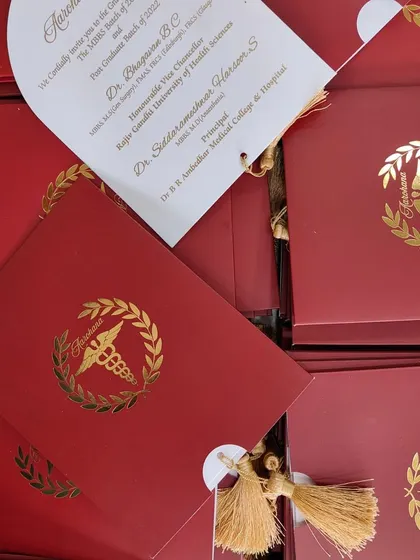 The complete graduation invitation suite, showcasing the cover, insert, and tassel, ready to be sent out for the special occasion.