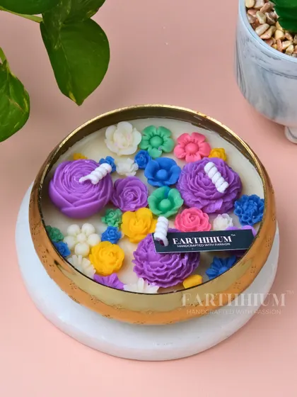 A vibrant, multi-color floral Urli candle that feels like a celebration in a bowl. I love combining bright wax flowers to create a piece that's full of joy and perfect for festive occasions or simply brightening your day.
