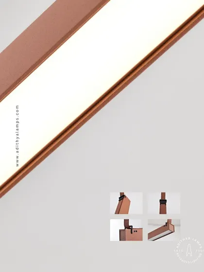 A close-up of the linear diffuser module from the Braided Tape Series, showing its sleek copper finish and connection points.