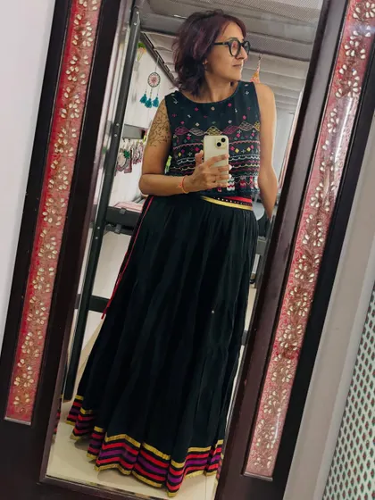 Another mirror selfie of the long skirt and crop top combo.