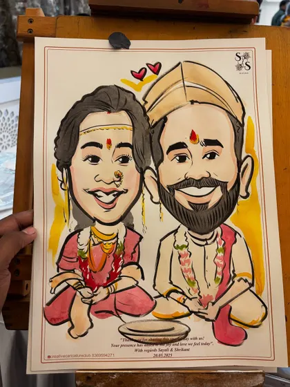 A close-up look at a custom wedding caricature, showing the detail in the traditional Maharashtrian attire and the vibrant watercolor finish. These make for a truly personal wedding gift.