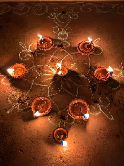 A traditional rangoli with diyas for Diwali. Creating these small, beautiful arrangements brings me so much peace and gratitude.