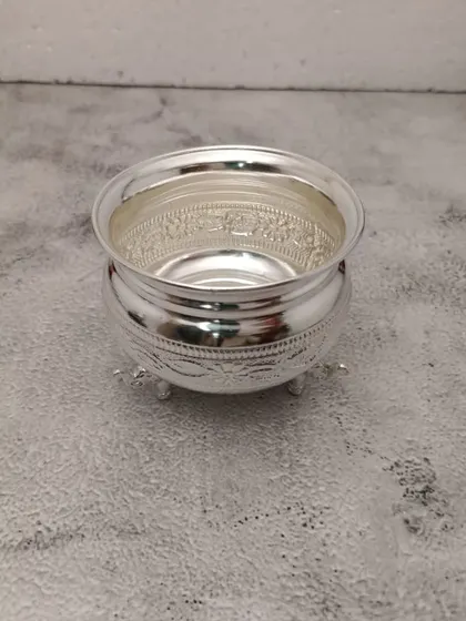 Another angle of the German silver bowl, showing its polished interior.