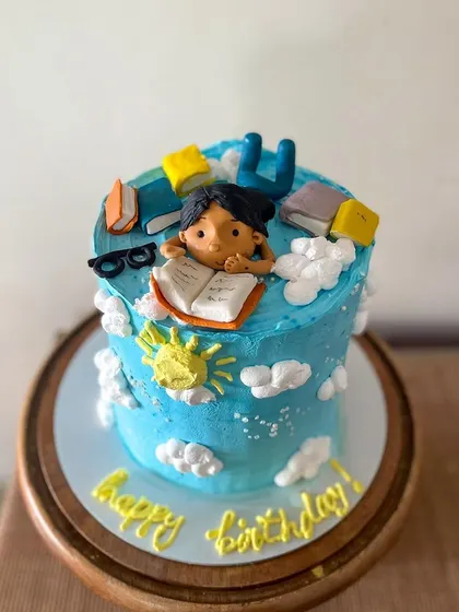 Another shot of the dreamy, book-themed birthday cake.