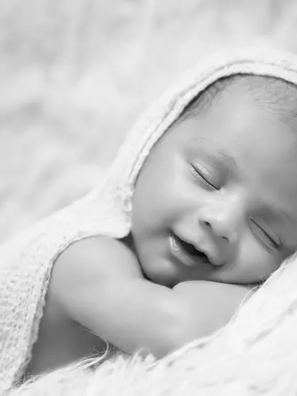 A simple, classic black and white portrait of a sleeping newborn. Sometimes, removing color brings out the pure emotion and peacefulness of the moment.