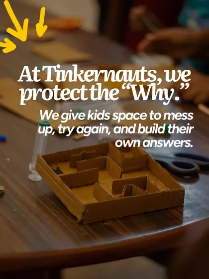 A close-up of a hydraulic maze project on a workshop table. Our goal is to protect the "Why" by giving kids the space and materials to build their own answers.