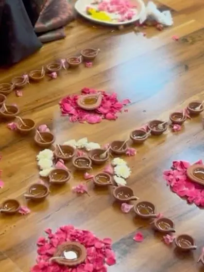 Another view of the intricate diya rangoli. The act of creating something beautiful together fosters a sense of unity and shared purpose. This is the essence of Satsang.