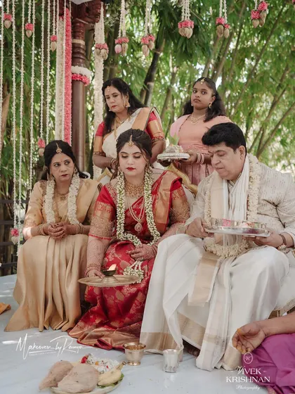 The bride, Sanjana, with her family during the wedding rituals. It's always an honor to be part of these intimate family moments and help everyone look picture-perfect.