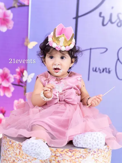 The birthday princess enjoying her cake. Capturing these sweet moments is what it's all about.