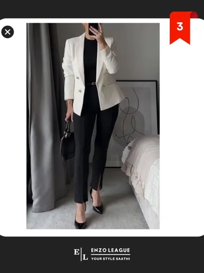 A white blazer is a versatile power piece. Pairing it with black trousers creates a classic, high-contrast look that is sharp, modern, and perfect for making a strong impression in any professional setting.