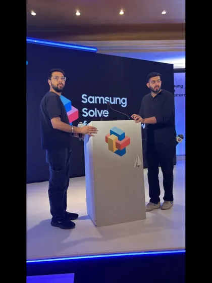 Our team positioning the lectern on stage for the Samsung Solve for Tomorrow event. Every element on stage is placed with precision.