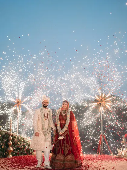 A Varmala moment that lights up the sky. We believe the big moments should feel larger than life, and for this couple at Oleander Farms, we made sure their union was celebrated with a spectacular firework display.