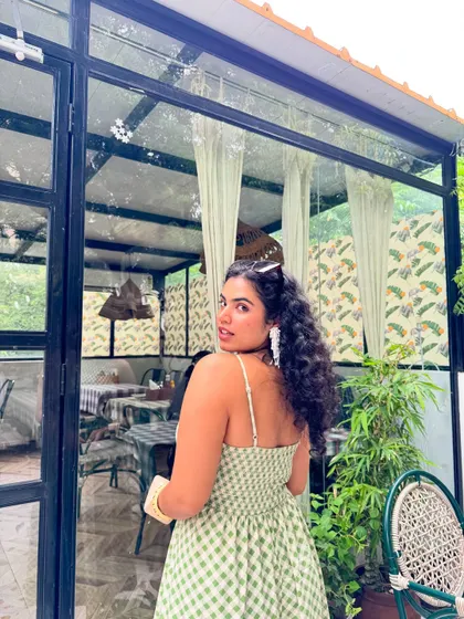 A look over the shoulder. The back of this gingham sundress has a simple tie detail, which adds a nice touch.