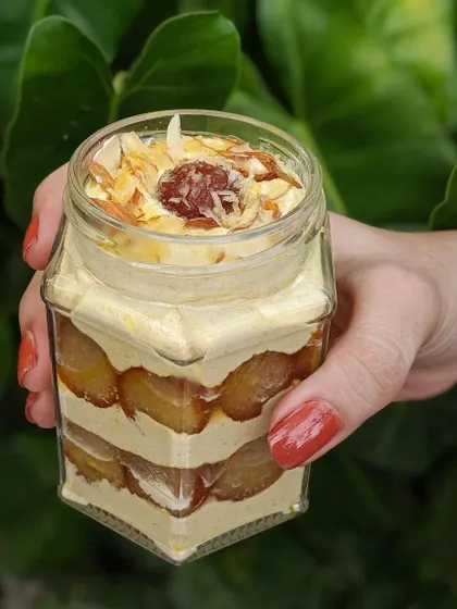 The Thandai Gulab Jamun Mousse Jar features layers of spiced thandai mousse and soft, decadent gulab jamuns for a perfect fusion dessert.