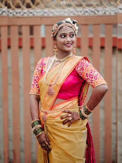 A confident and happy bridal portrait. The bride's pose and smile exude joy and anticipation.