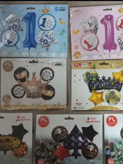 Themed balloon sets for 'First Birthday Boy' and 'First Birthday Girl' parties are available, as well as sets for adult themes like casino nights.