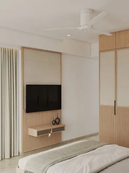 A 3D render of a Japandi master bedroom with a minimalist wardrobe featuring fluted panels and light veneer. Rattan and wood accents infuse natural charm.