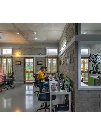 A duplicate of image 68, showing the open-plan workspace.