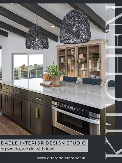 We design kitchens that are the heart of the home, like this one with a large island, dark wood cabinets, and statement pendant lighting.